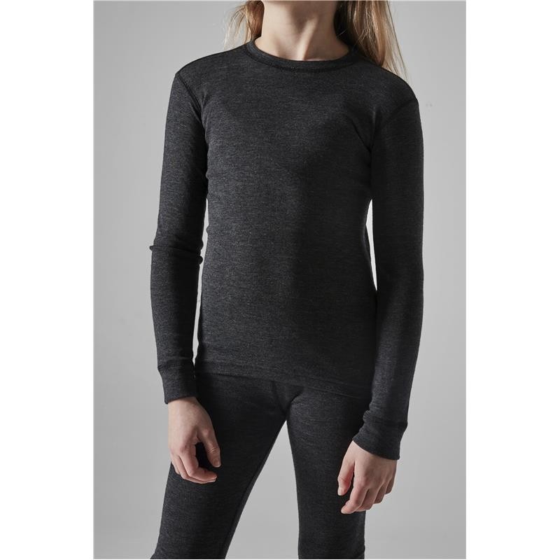 Otroško smučarsko spodnje perilo CRAFT Wool Merino iz merino volne in recikliranega poliestra nudi vrhunsko toploto, suhost in udobje v najhladnejših zimskih dneh. Idealno za smučanje in zimske športe.