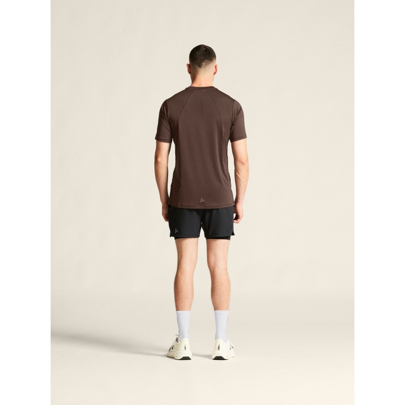 Kakovostna moška športna majica CRAFT za tek, fitness in trening. Zračna, hitro sušeča in udobna za aktivne. Na voljo v AS Sport Outlet.