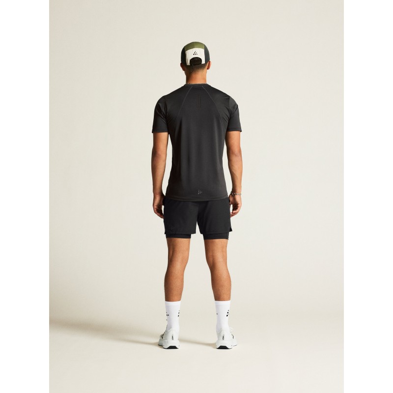 Kakovostna moška športna majica CRAFT za tek, fitness in trening. Zračna, hitro sušeča in udobna za aktivne. Na voljo v AS Sport Outlet.