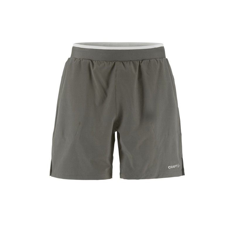 Funkcionalne moške kratke hlače CRAFT 2v1 za tek in trening. Notranje pajkice, žep za telefon in odlično udobje. Na voljo v AS Sport Outlet.