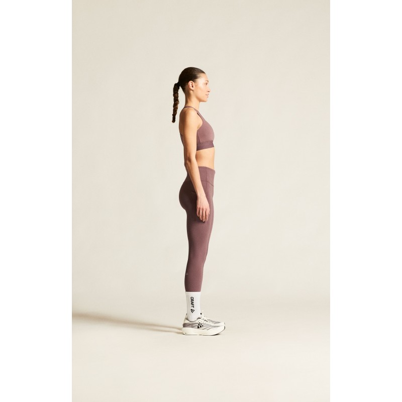 Udobne ženske dolge pajkice CRAFT za tek, fitness in trening. Elastične, neprosojne in z visokim pasom. Popolna izbira za šport. Na voljo v AS Sport Outlet.