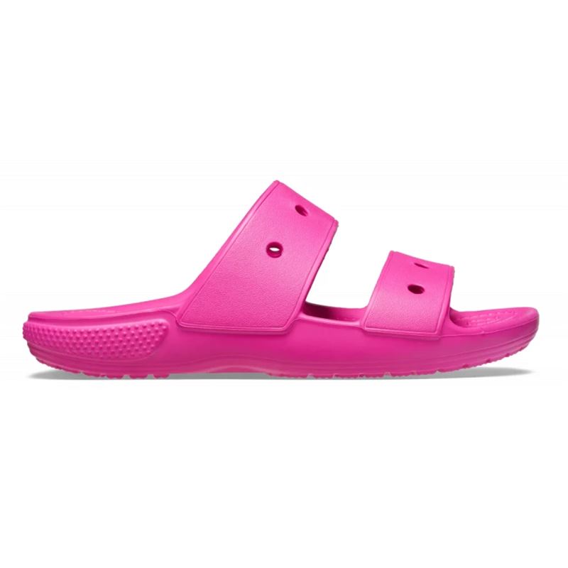 Otroški Crocs Classic Sandal 207536 so prikazani kot lahki in praktični sandali z značilnim preprostim Crocs dizajnom. Model ima dva nastavljiva paščka, ki omogočata varno in prilagodljivo prileganje otroškemu stopalu.