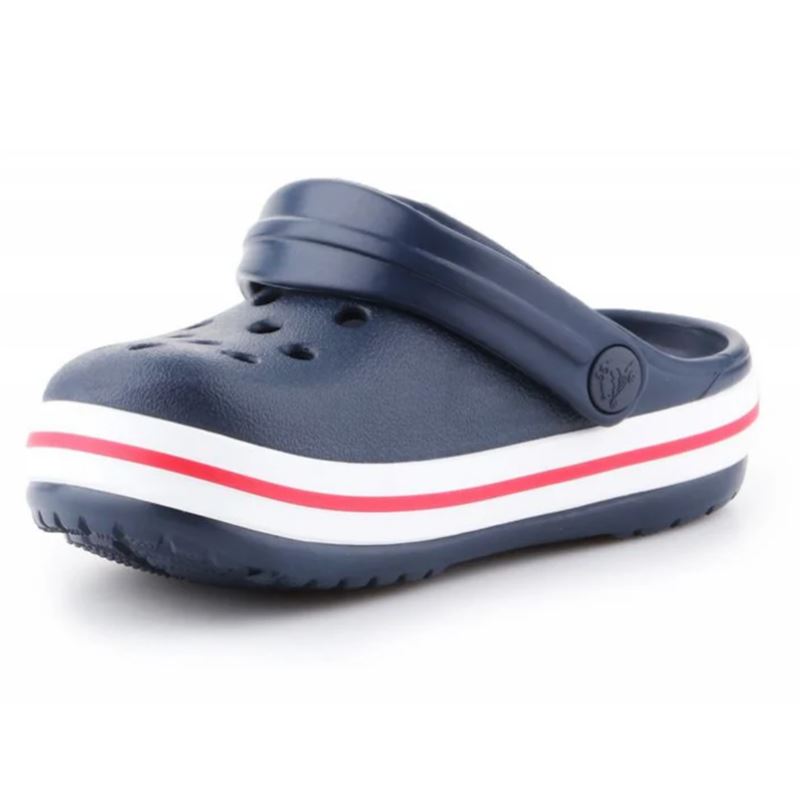 Športni in udobni Crocs Crocband Clog – otroški natikači z legendarnim Crocs udobjem in prepoznavnim Crocband dizajnom. Lahka Croslite™ zasnova, prezračevalne odprtine in stabilen pašček zagotavljajo brezskrbno igro, vrtec in poletne dogodivščine vsak dan.