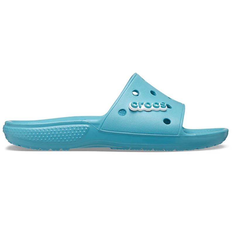 Crocs Classic Slide 206121 ponujajo maksimalno udobje v preprostem, minimalističnem dizajnu. Lahka Croslite™ pena zagotavlja mehko blaženje in vodoodpornost, zato so idealni natikači za poletne dni, plažo ali sproščeno vsakodnevno uporabo.