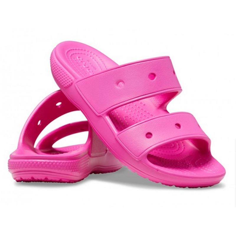 Crocs Classic Sandal 206761 so lahki in udobni sandali, ki združujejo preprost dizajn in praktičnost za vsak dan. Izdelani iz Croslite™ materiala zagotavljajo mehko blaženje, vodoodpornost in hitro sušenje, dvojni trakovi pa poskrbijo za stabilno in udobno prileganje pri poletnih aktivnostih, sprehodih ali na plaži.