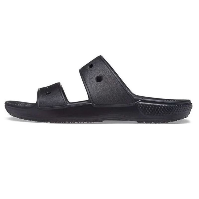 Crocs Classic Sandal 206761 so prikazani kot lahki in praktični poletni sandali z značilnim Crocs dizajnom. Model ima dva nastavljiva paščka, ki omogočata dobro prileganje stopalu, ter mehko Croslite podlago za udobje pri vsakem koraku.