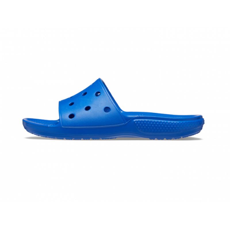 Lahki in udobni natikači Crocs Classic Slide 206121 navdušujejo z minimalističnim dizajnom in vrhunskim udobjem. Izdelani iz Croslite™ pene so mehki, vodoodporni in hitro sušeči, zato so popolna izbira za poletne dni, plažo ali sproščeno nošenje doma.
