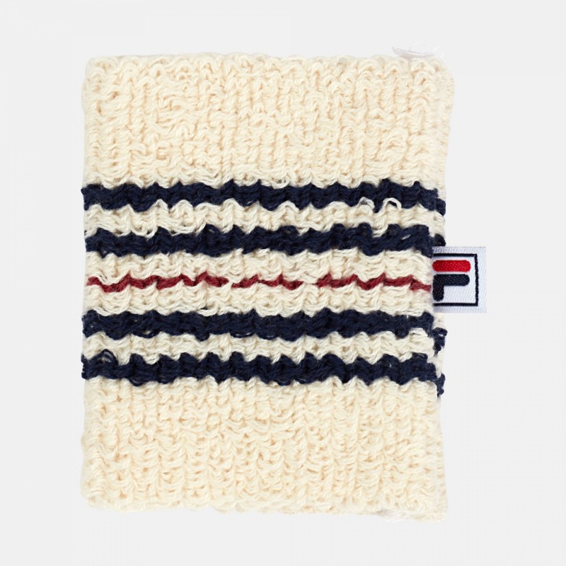 Zapestnica Rory - frotir znojnik, vpija znoj in se zato hitro suši. Izdelan iz nedrsečega bombaža in ima retro videz s črtami Fila.