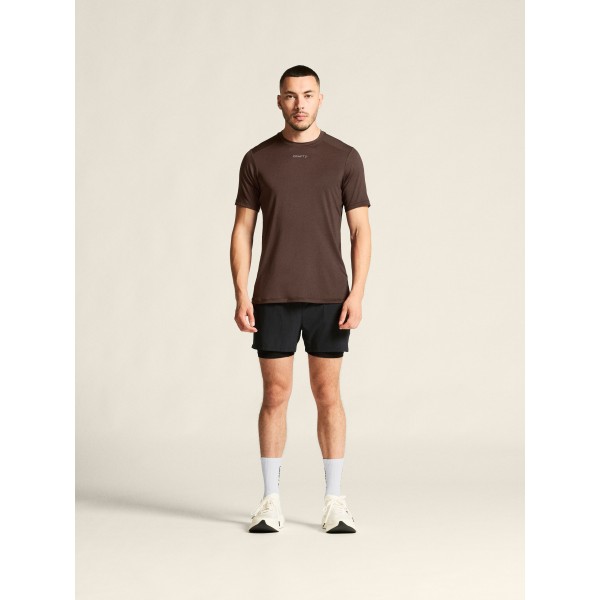 Kakovostna moška športna majica CRAFT za tek, fitness in trening. Zračna, hitro sušeča in udobna za aktivne. Na voljo v AS Sport Outlet.