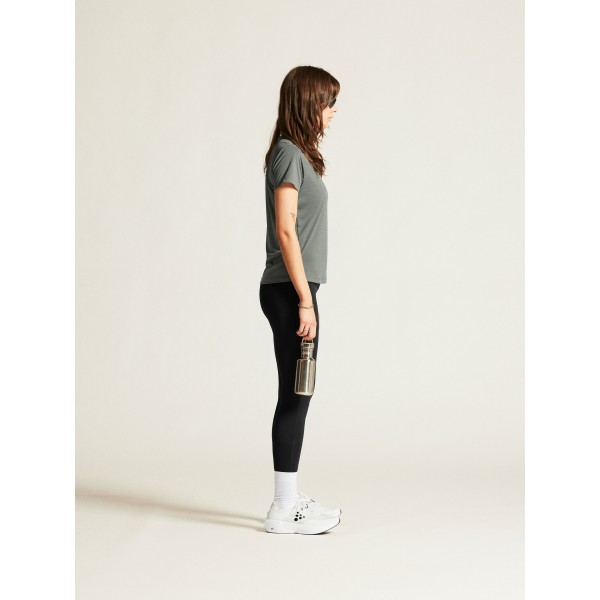 Udobna ženska športna majica CRAFT za tek, fitness in trening. Zračna, lahka in hitro sušeča. Idealna za šport. Na voljo v AS Sport Outlet.