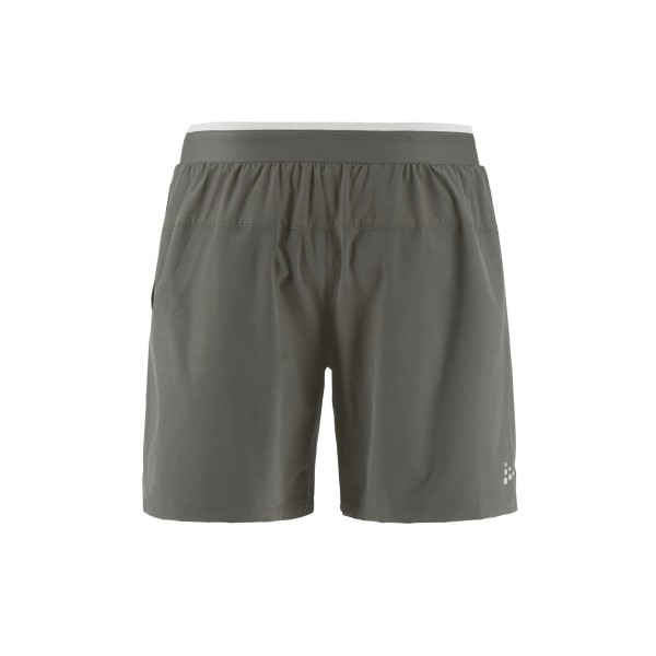 Funkcionalne moške kratke hlače CRAFT 2v1 za tek in trening. Notranje pajkice, žep za telefon in odlično udobje. Na voljo v AS Sport Outlet.