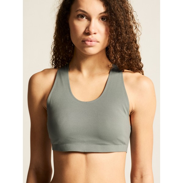 Udoben športni nedrček CRAFT s snemljivimi košaricami. Mehak, elastičen in idealen za fitness, jogo in trening. Na voljo v AS Sport Outlet