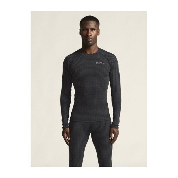 Moška termo majica CRAFT Wool Extreme X LS 2 združuje merino volno in napredno tehnologijo za toploto, suhost in udobje v mrazu. Idealna za tek na smučeh, zimski tek in pohodništvo.
