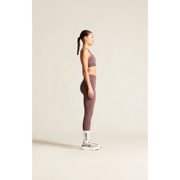 Udobne ženske dolge pajkice CRAFT za tek, fitness in trening. Elastične, neprosojne in z visokim pasom. Popolna izbira za šport. Na voljo v AS Sport Outlet.