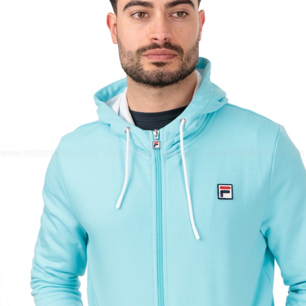 Unisex hoodie FILA ROBIN is light blue, has a zipper, and a smaller logo on the left side. This versatile hoodie is made from a combination of cotton and polyester and is extremely comfortable and pleasant to the touch.
