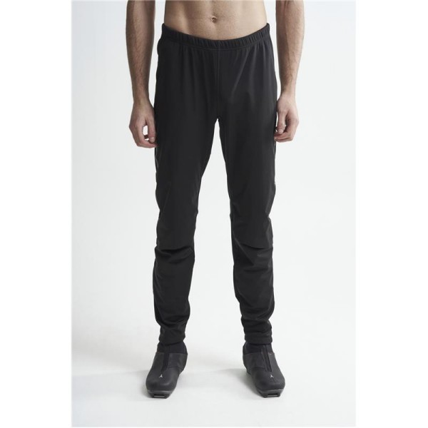The men's long winter leggings CRAFT ADV NORDIC TRAINING are warm and stretchy leggings designed for cross-country skiers who run even when the wind is blowing hard across the track.