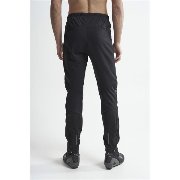 The men's long winter leggings CRAFT ADV NORDIC TRAINING are warm and stretchy leggings designed for cross-country skiers who run even when the wind is blowing hard across the track.
