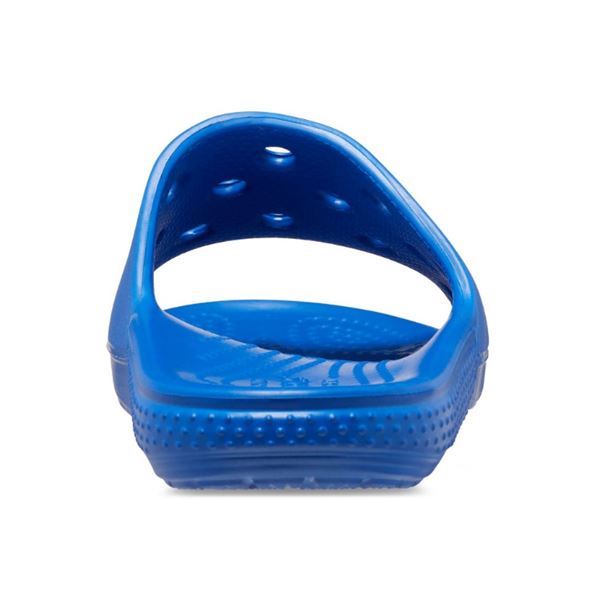 Lahki in udobni Crocs Classic Slide Kids – otroški natikači v praktičnem slide dizajnu za hitro obuvanje in brezskrbne poletne dni. Croslite™ material zagotavlja mehko blaženje, lahkotnost in udobje pri vsakem koraku, zato so idealni za plažo, bazen ali vsakodnevno igro