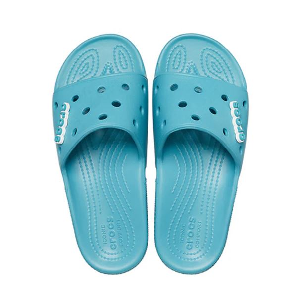 Crocs Classic Slide 206121 ponujajo maksimalno udobje v preprostem, minimalističnem dizajnu. Lahka Croslite™ pena zagotavlja mehko blaženje in vodoodpornost, zato so idealni natikači za poletne dni, plažo ali sproščeno vsakodnevno uporabo.
