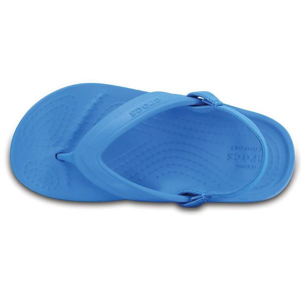 Crocs Classic Flip Kids 202871 otroške japonke iz Croslite™ materiala z mehkim trakom med prsti, lahke, udobne in primerne za plažo, bazen ter poletne aktivnosti.