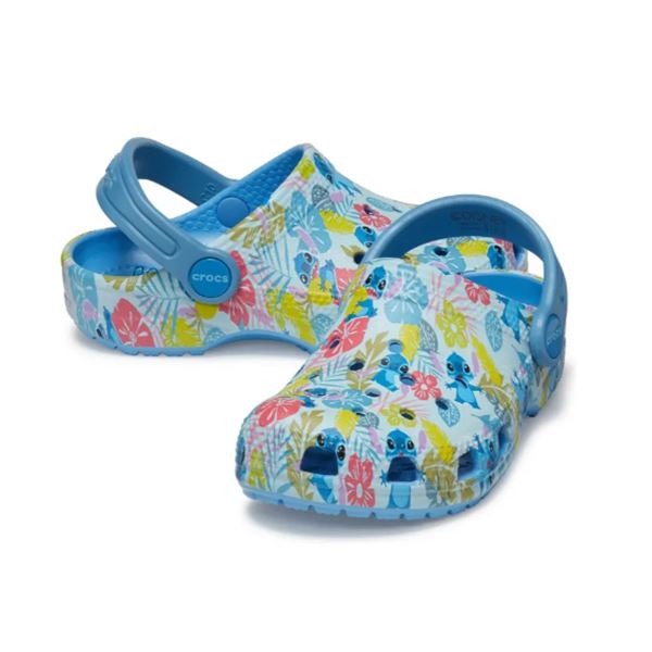 Otroški natikači Crocs Classic Printed Clog Kids z igrivim potiskom in lahkim Croslite™ podplatom za udobno vsakodnevno uporabo.