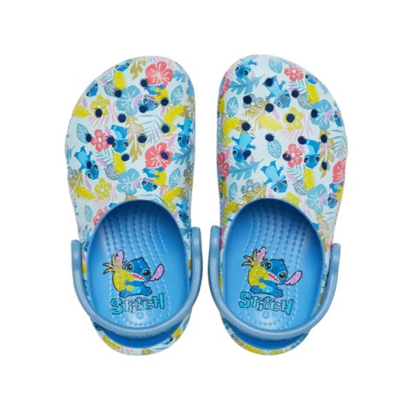 Otroški natikači Crocs Classic Printed Clog Kids z igrivim potiskom in lahkim Croslite™ podplatom za udobno vsakodnevno uporabo.