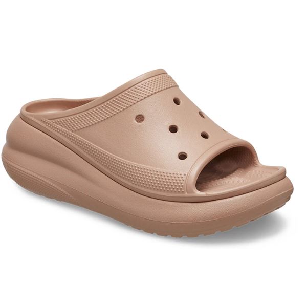 Ženski natikači Crocs Crush Slide 208731 z modernim platformnim podplatom, minimalističnim dizajnom in lahkotno zasnovo za udobne poletne dni.
