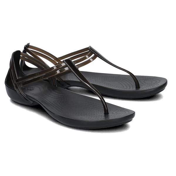 Elegantni sandali Crocs Isabella T-Strap z lahkim Croslite™ podplatom in ženstvenim T-paščkom za udobne poletne dni.