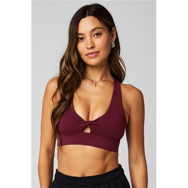 Ženski športni nedrček FABLETICS Oasis Twist Sports Bra s srednjo podporo, twist dizajnom in udobnim krojem za vadbo.