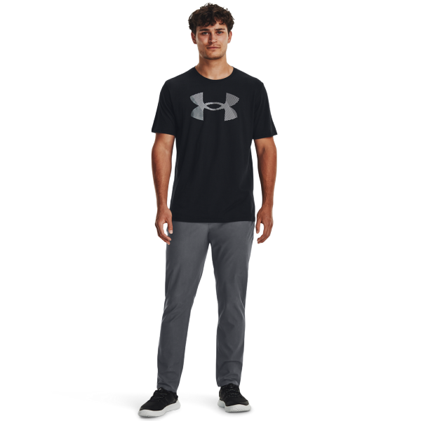 The Under Armour Big Logo Fill SS men's t-shirt is stylishly designed for men seeking comfort during sports activities and everyday wear. Made from soft, quick-drying material, it effectively wicks away sweat, helping you stay dry and fresh.