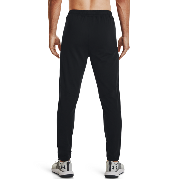 The Under Armour Meridian Tapered Pants 1373730-001 men's tracksuit is designed for comfort and practicality during workouts or everyday activities. Made from soft and stretchy material, the tracksuit provides freedom of movement and a comfortable fit.