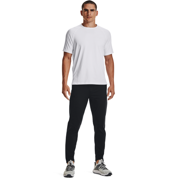 The Under Armour Meridian Tapered Pants 1373730-001 men's tracksuit is designed for comfort and practicality during workouts or everyday activities. Made from soft and stretchy material, the tracksuit provides freedom of movement and a comfortable fit.