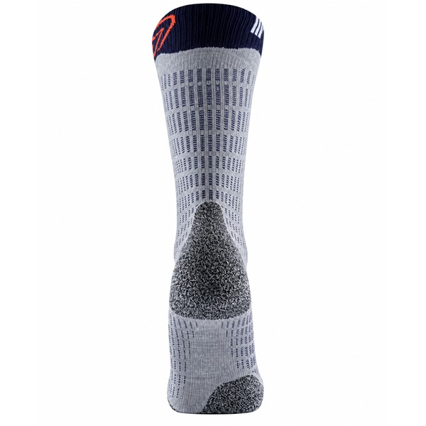Tople unisex smučarske nogavice SIDAS Merino White Blue s 44 % merino volne, anatomsko konstrukcijo ter zaščito goleni, pete in prstov.