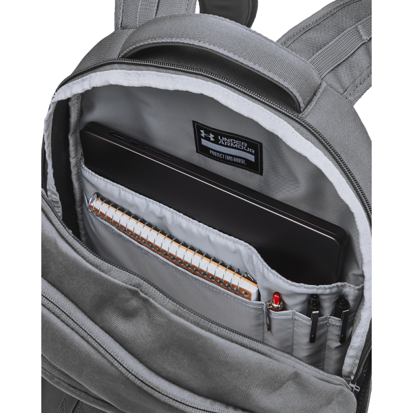 Discover the Under Armour Hustle 6.0 backpack, ideal for active individuals. Equipped with UA Storm technology, this backpack repels water and provides protection. It has a soft compartment for a laptop, a secure zip pocket, and a side pocket for a water bottle.