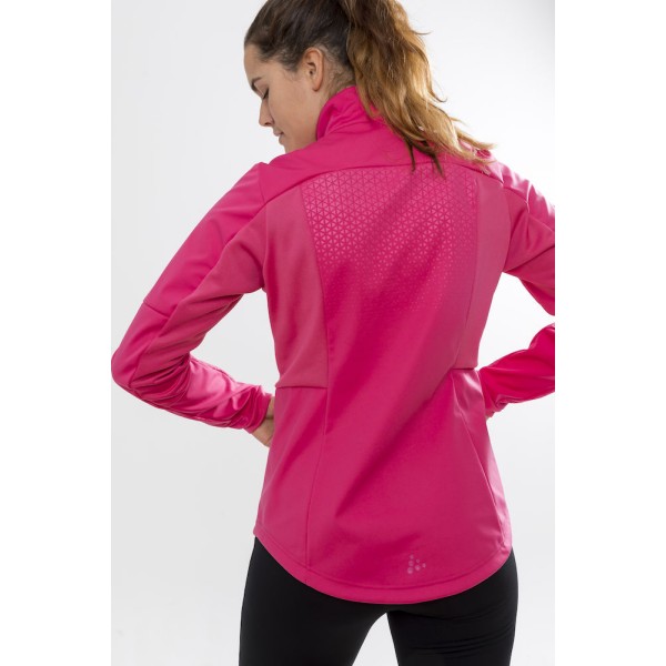 The women's softshell jacket CRAFT WARM TRAIN is a functional training jacket that keeps you warm and dry during workouts in cold and wet conditions. The jacket combines a 3-layer windproof and waterproof membrane fabric on the body and sleeves.