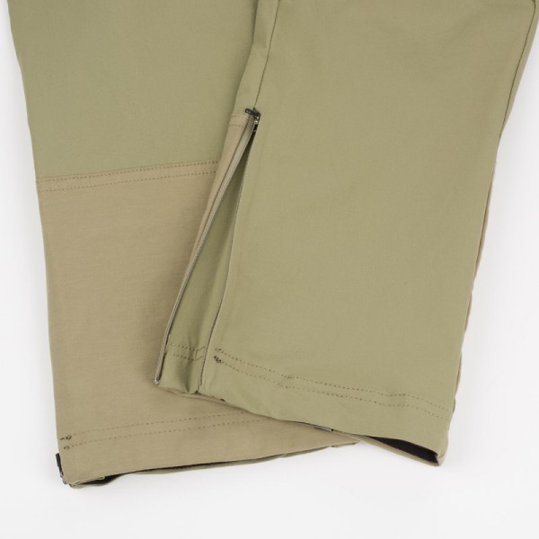 Lightweight technical material provides quality protection, durability, and optimal body temperature during outdoor activities. The comfortable cut of the pants ensures freedom of movement, such as a slim fit and zippered extensions at the bottom.