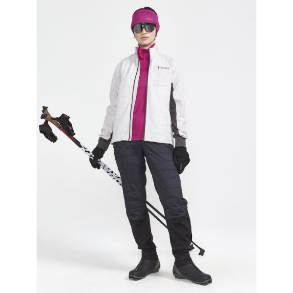 The CRAFT CORE Nordic Training Insulate functional jacket is a versatile jacket primarily designed for cross-country skiing and other intense activities in cold conditions. The jacket features quilted insulation in the front for added warmth,