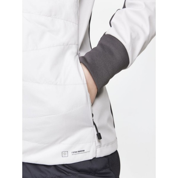 The CRAFT CORE Nordic Training Insulate functional jacket is a versatile jacket primarily designed for cross-country skiing and other intense activities in cold conditions. The jacket features quilted insulation in the front for added warmth,