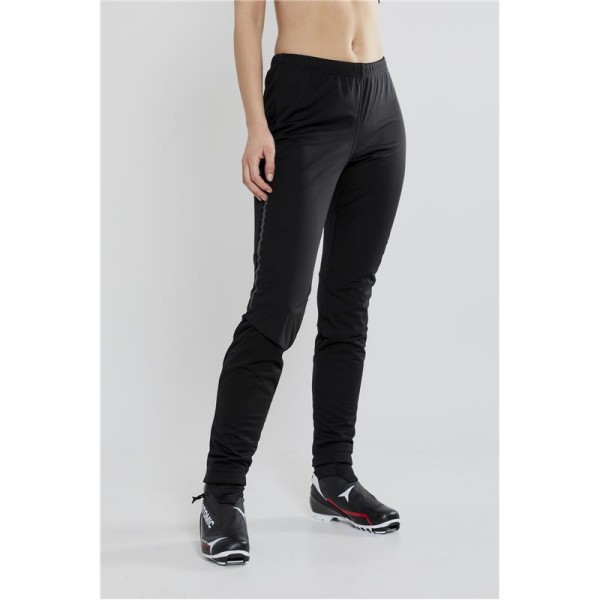 Women's long winter leggings CRAFT ADV NORDIC TRAINING are warm and stretchy leggings designed for cross-country skiers who ski in all conditions and need good protection against cold, wind, and water, while also ensuring optimal moisture transfer outward.
