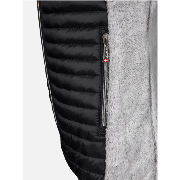 Ženski smučarski brezrokavnik AULP UNIMA iz mehkega umetnega krzna nudi ravno prav topline in popolno svobodo gibanja. Idealen za plastno oblačenje v gorah ali mestu. Slim fit kroj za eleganten videz.