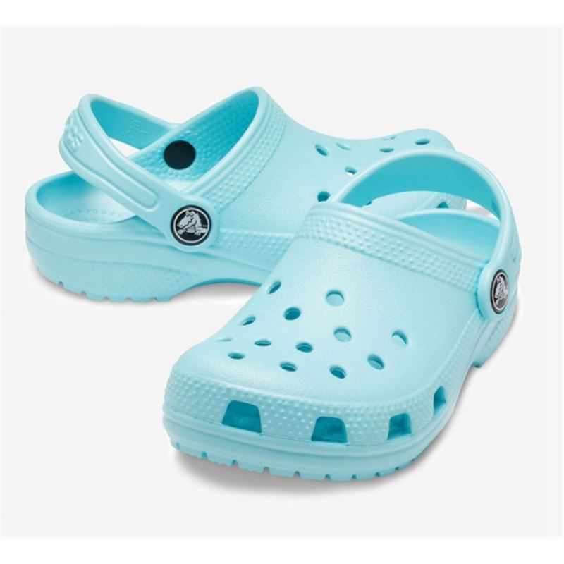 Otroški natikači Crocs Classic Clog K 204536 z lahkotno zasnovo, prezračevalnimi odprtinami in vrtljivim petnim paščkom za udobno vsakodnevno uporabo.