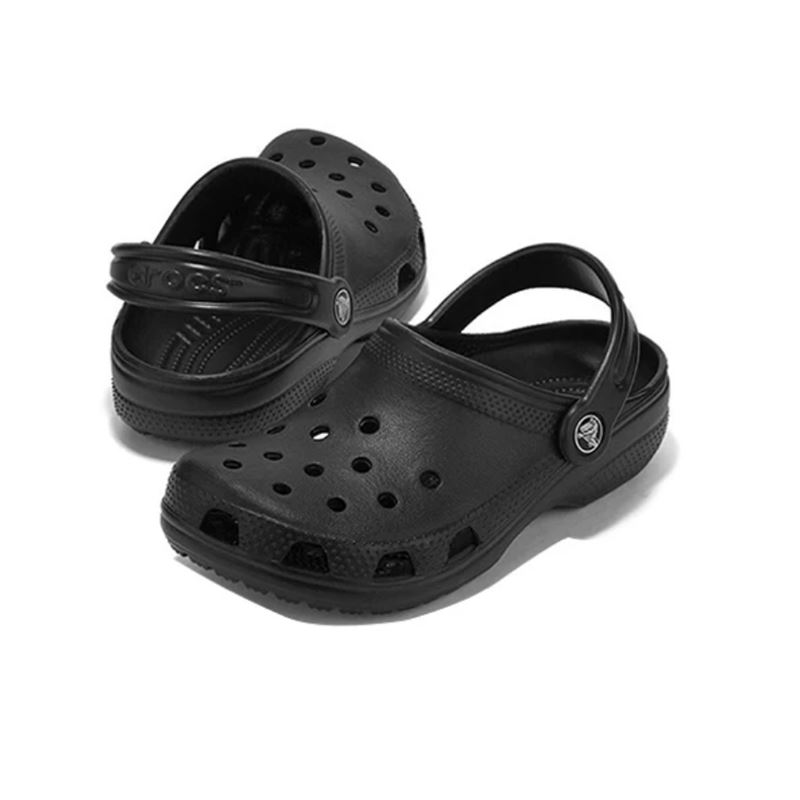 Otroški natikači Crocs Classic Clog K 204536 z lahkotno zasnovo, prezračevalnimi odprtinami in vrtljivim petnim paščkom za udobno vsakodnevno uporabo.