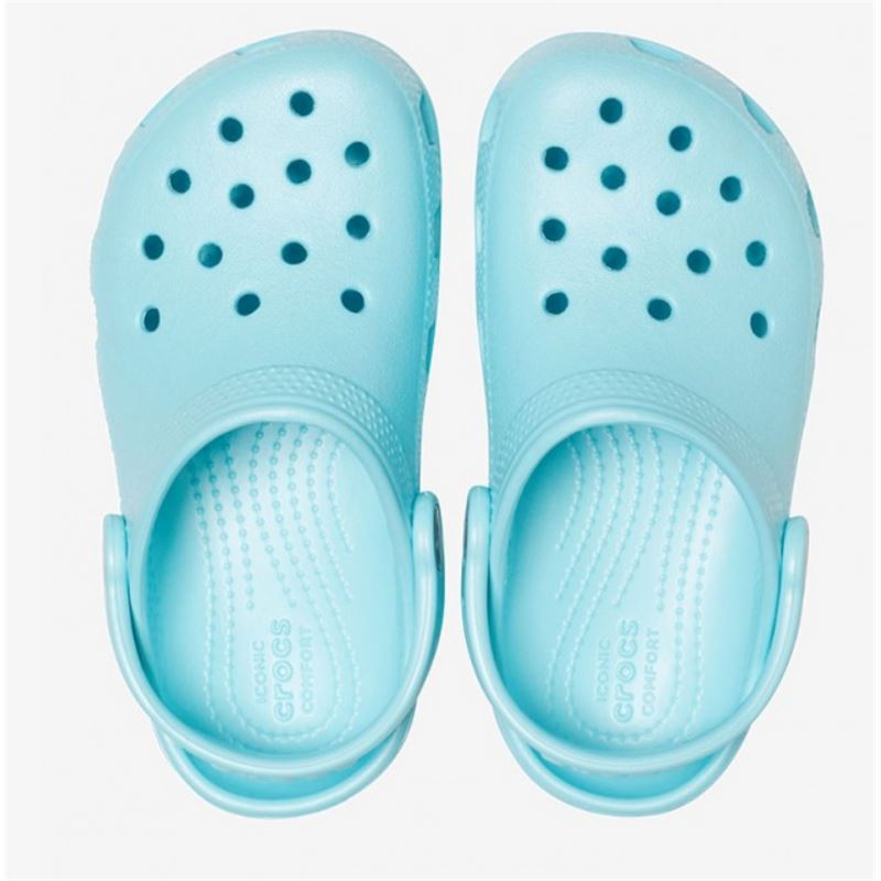 Otroški natikači Crocs Classic Clog K 204536 z lahkotno zasnovo, prezračevalnimi odprtinami in vrtljivim petnim paščkom za udobno vsakodnevno uporabo.