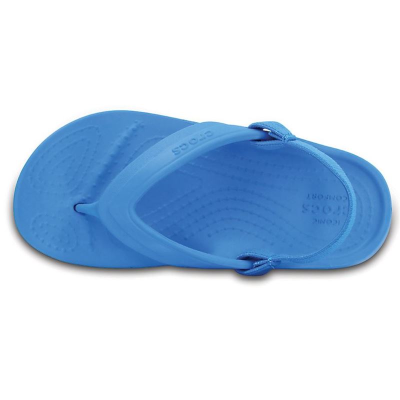 Crocs Classic Flip Kids 202871 otroške japonke iz Croslite™ materiala z mehkim trakom med prsti, lahke, udobne in primerne za plažo, bazen ter poletne aktivnosti.