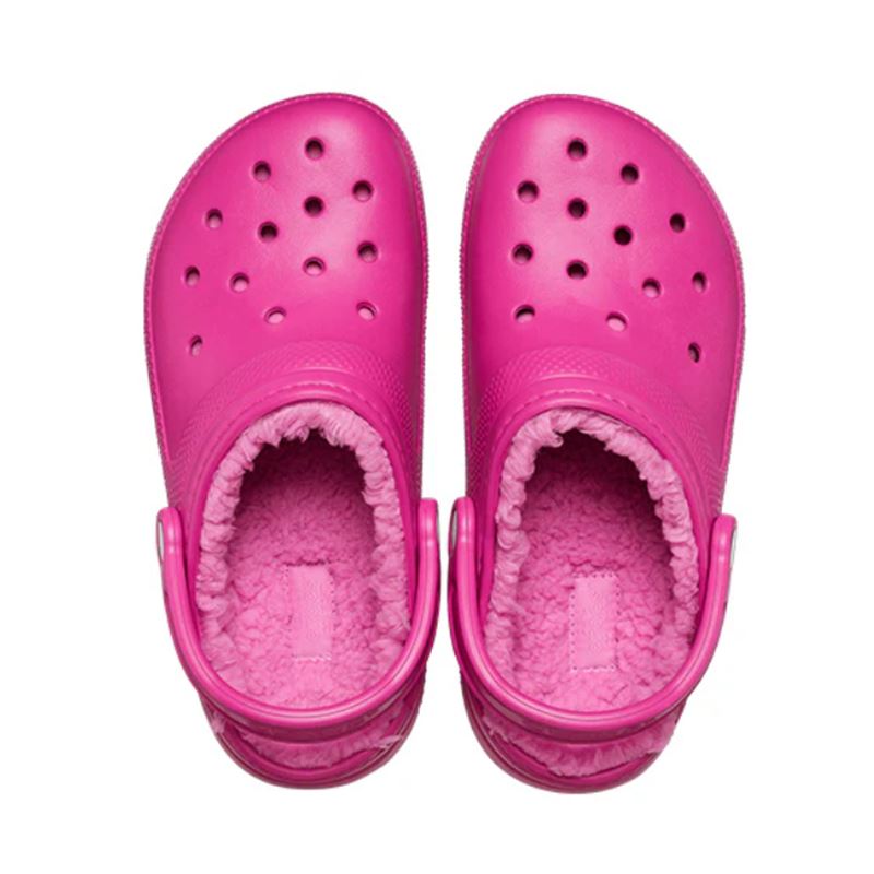Klasični natikači Crocs Classic Lined Clog 203591 z mehko toplo podlogo, lahkotno zasnovo in vrtljivim petnim paščkom za udobno nošenje v hladnejših dneh.