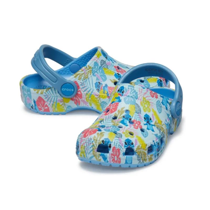 Otroški natikači Crocs Classic Printed Clog Kids z igrivim potiskom in lahkim Croslite™ podplatom za udobno vsakodnevno uporabo.