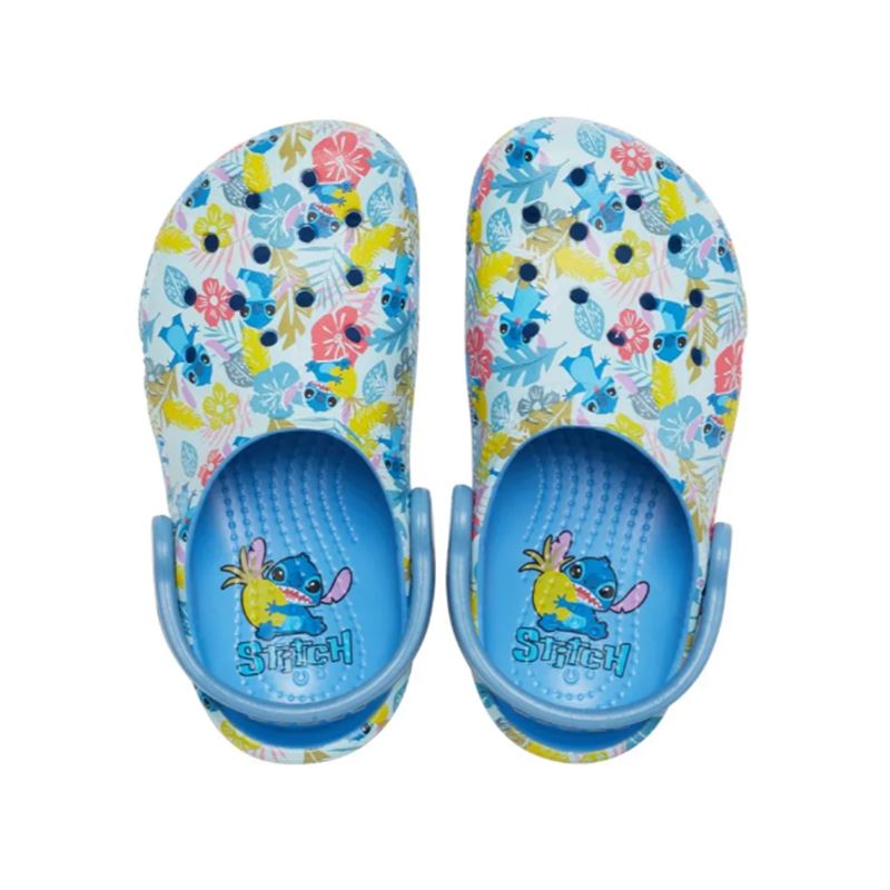 Otroški natikači Crocs Classic Printed Clog Kids z igrivim potiskom in lahkim Croslite™ podplatom za udobno vsakodnevno uporabo.