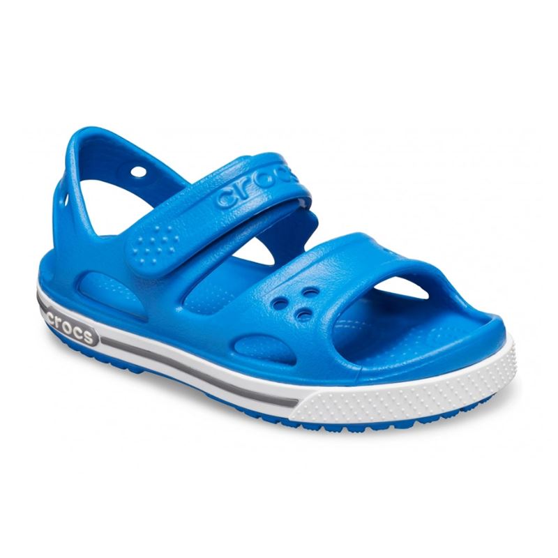 Crocs Crocband II Sandal PS 14854 otroški športni sandali z nastavljivim paščkom, Croslite™ podplatom in zračno odprto zasnovo za udobje, stabilnost in brezskrbno poletno igro.
