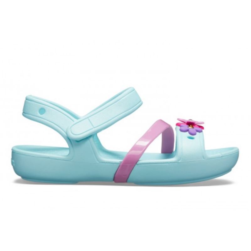 Crocs Lina Charm Sandal Kids 205530 otroški sandali z dekorativnimi charm dodatki, nastavljivimi paščki in Croslite™ podplatom za udobje, zračnost in igriv poletni videz.