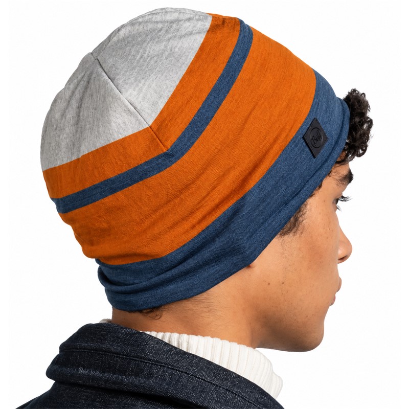 Topla in udobna pletena kapa BUFF® Merino Move Beanie Steel Blue iz 91 % merino volne z gramaturo 250 g/m², brezšivno konstrukcijo in privlačnim barvnim dizajnom za pohodništvo, zimske sprehode in vsakodnevno uporabo.